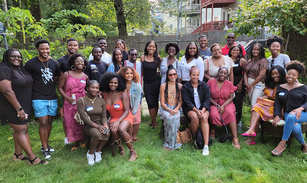 Incoming Black BC Law students pose in a backyard