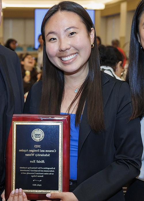 May 2, 2023 --Boston College's Benigno and Corazon Aquino Scholarship event, held in the faculty dining room of McElroy. The award recognizes a BC junior with a strong academic record who has been actively engaged in Asian American issues and service to the Asian American community on or off campus. This year's winner is Heidi Yun '24.